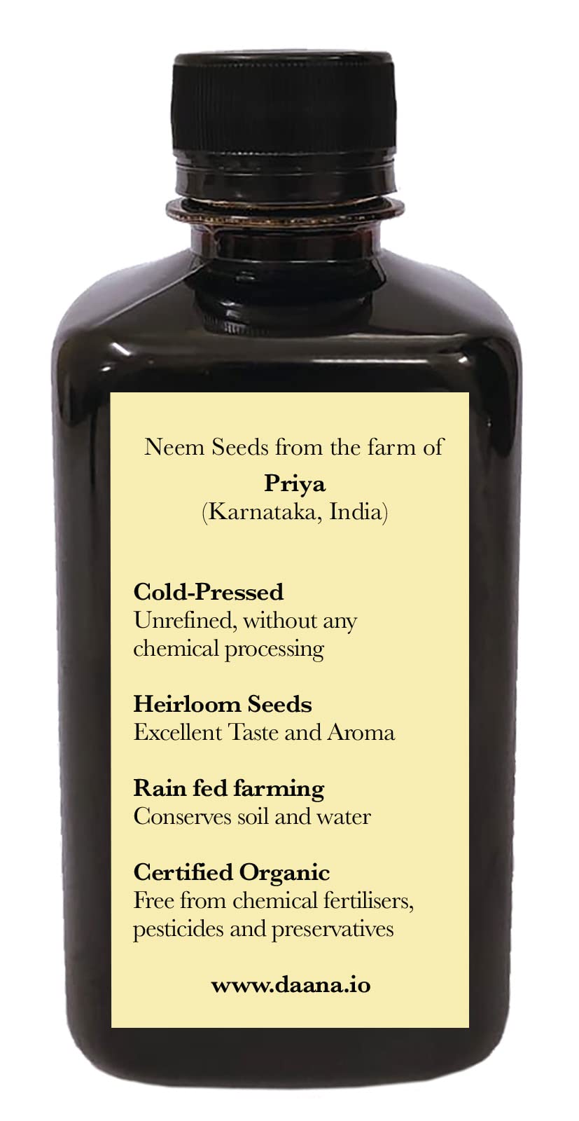 DAANA oil pouring from bottle into a spoon showing easy dispensing for DIY blends