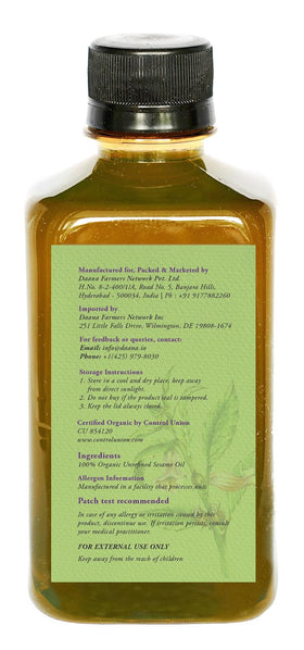 DAANA sesame oil close texture on palm highlighting smooth, non-greasy finish benefit