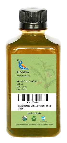 DAANA sesame oil being massaged into scalp to condition and reduce dryness benefit