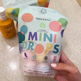 Dabble & Dollop bath bombs fizzing in tub during use for playful sensory benefit