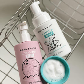 Dabble & Dollop foam whip dispensed into hand creating instant playful bubbles