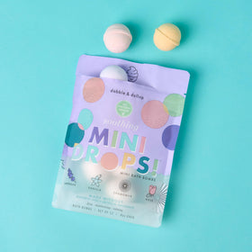 Dabble & Dollop open resealable pouch revealing neatly wrapped bombs for storage benefit
