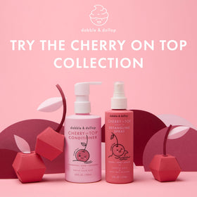Dabble & Dollop bottles on bathroom shelf in family-friendly lifestyle setting