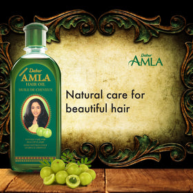 Dabur amla hair oil applied during scalp massage improving absorption and circulation