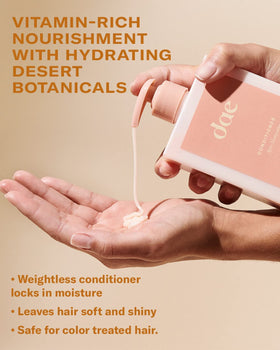 DAE conditioner applied to hair ends showing detangling and softening benefit