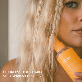 DAE styled wavy hair demonstrating soft waves and volume benefit