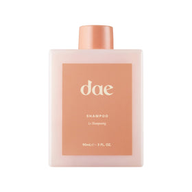 DAE front bottle view showing compact travel size and clear branding benefits portability