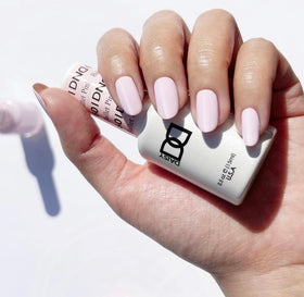 DAISY DND open duo display showing matching gel and lacquer for easy pairing