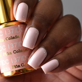 DAISY DND bottle closeup highlighting cap and brush for precise application