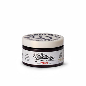 DandyMen pomade front label showing strong hold and high shine benefits