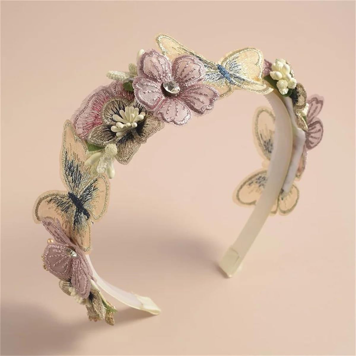 DANRENPANG front view pink butterfly headband showing full floral arrangement and warm tones