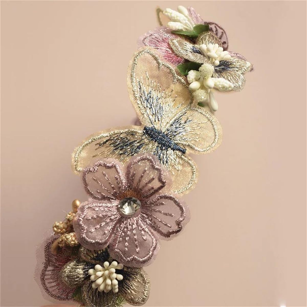 DANRENPANG side detail of embroidered butterfly and sparkling center for added elegance