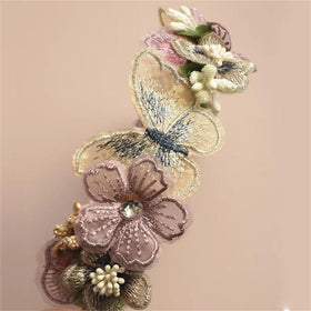 DANRENPANG side detail of embroidered butterfly and sparkling center for added elegance