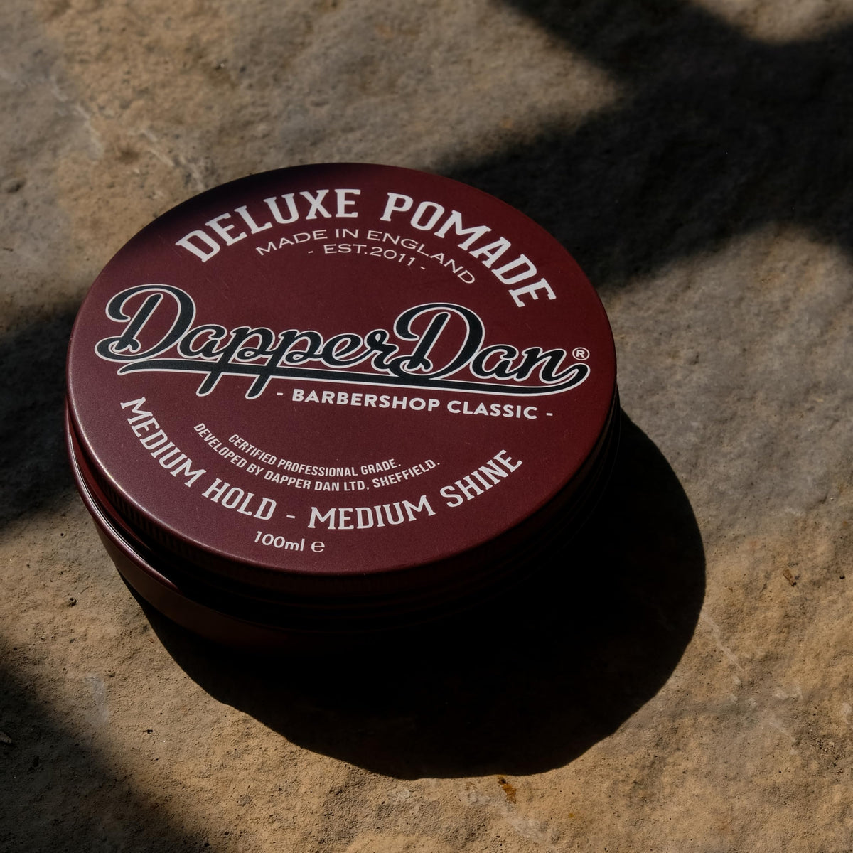 Dapper Dan label close-up highlighting scent and hold details for shoppers
