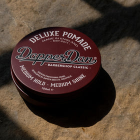 Dapper Dan label close-up highlighting scent and hold details for shoppers