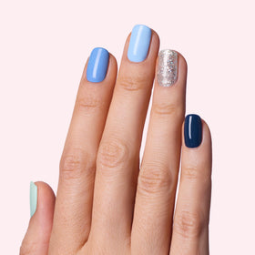 Dashing Diva close-up of blue pattern strips showing design detail and salon-grade finish