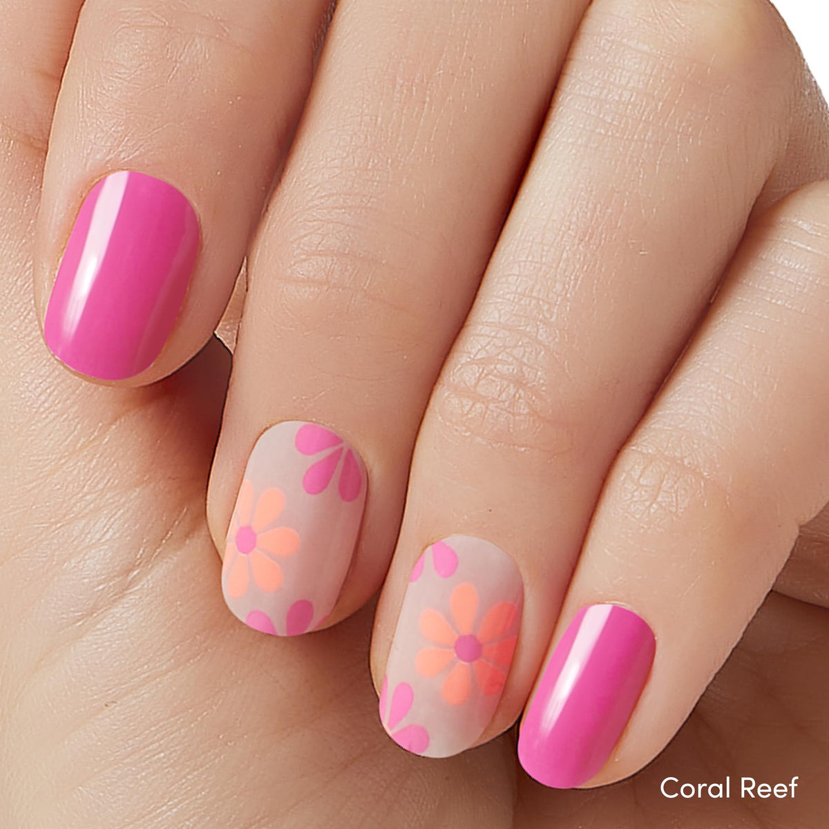 Dashing Diva Coral Reef strip close-up showing glossy gel-effect finish
