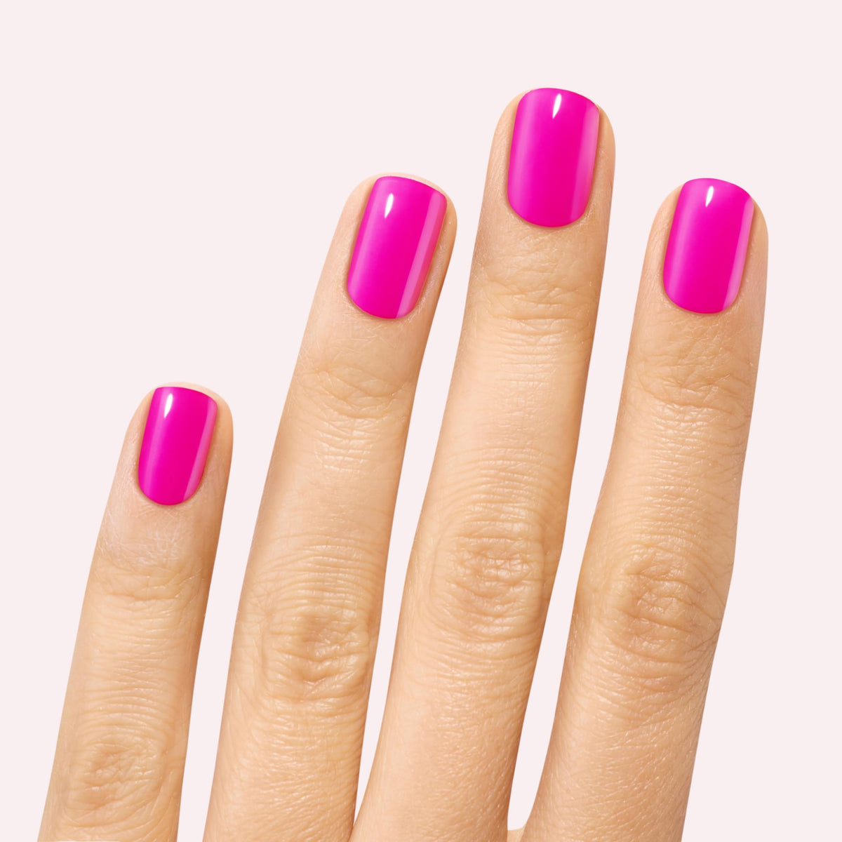Dashing Diva Magenta Madness close-up showing glossy texture and vibrant color payoff