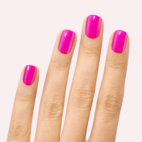 Dashing Diva Magenta Madness close-up showing glossy texture and vibrant color payoff