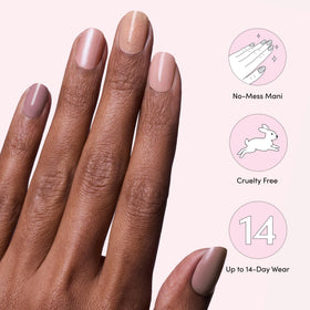 Dashing Diva worn manicure on hands showing nude shades and long-lasting glossy benefit