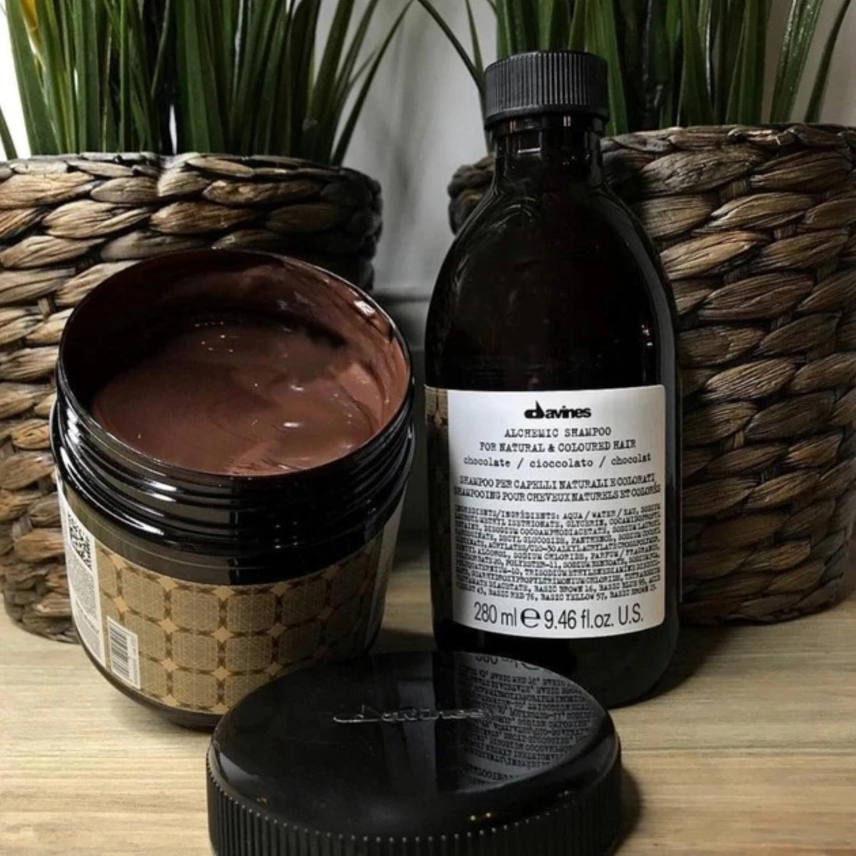 Davines conditioner being applied to damp hair in shower for tone refresh