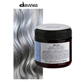 Close-up of conditioner cream texture from Davines highlighting smooth color-depositing consistency