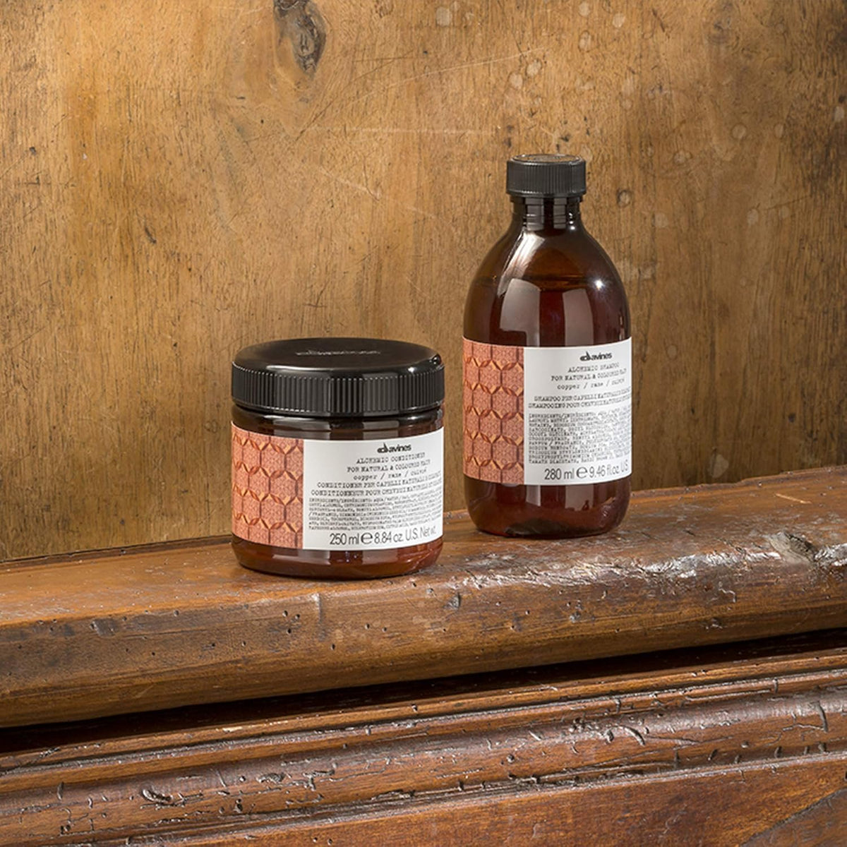 Davines sustainable packaging and box for Alchemic Shampoo Copper emphasizing brand care