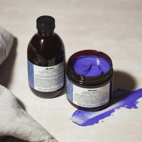 Davines bottle next to ruler for clear size and travel-friendly reference