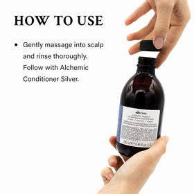 Davines shampoo in hand applied to hair for even pigment distribution benefit