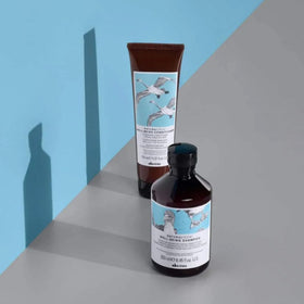 Davines before and after detangling hair showing smoother manageable results