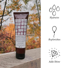 Davines conditioner being applied to wet hair to detangle and protect