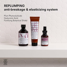 Davines conditioner staged in bathroom to suggest daily nourishing routine