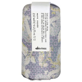 Davines gel-oil texture on hand demonstrating creamy-to-oil finish and moisturizing benefits