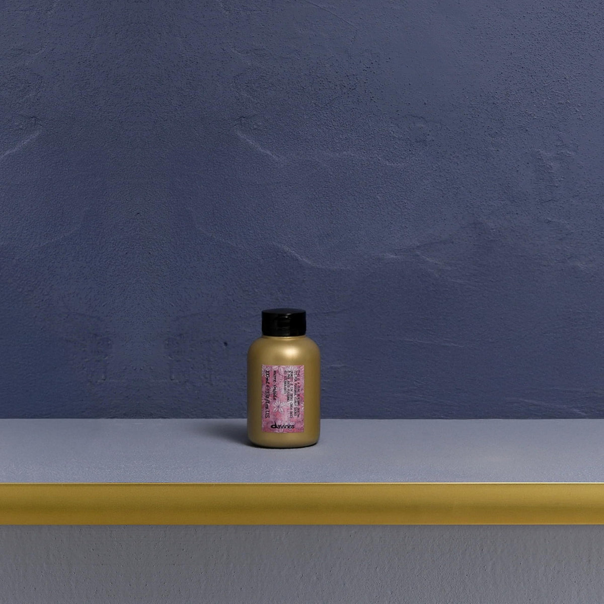 Davines serum texture on skin showing lightweight drop and fast absorption benefit