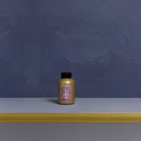 Davines serum texture on skin showing lightweight drop and fast absorption benefit