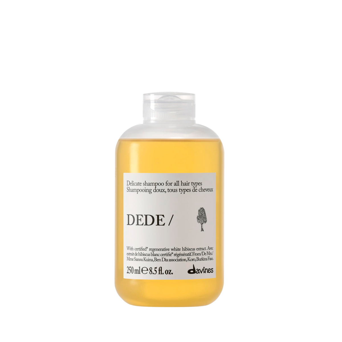 Davines DEDE/ front bottle showing clean minimal packaging and daily-use benefit