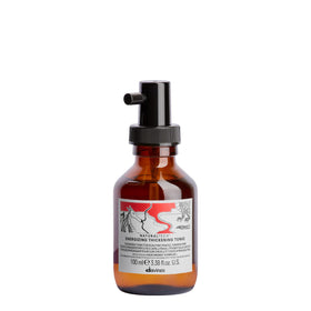 Davines bottle front packaging shows energizing thickening tonic benefit