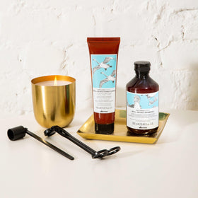 Davines bottle in shower scene showing in-use rinse and fresh scalp sensation