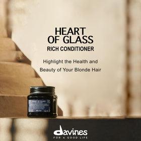 Davines conditioner being applied in shower for smoother detangling