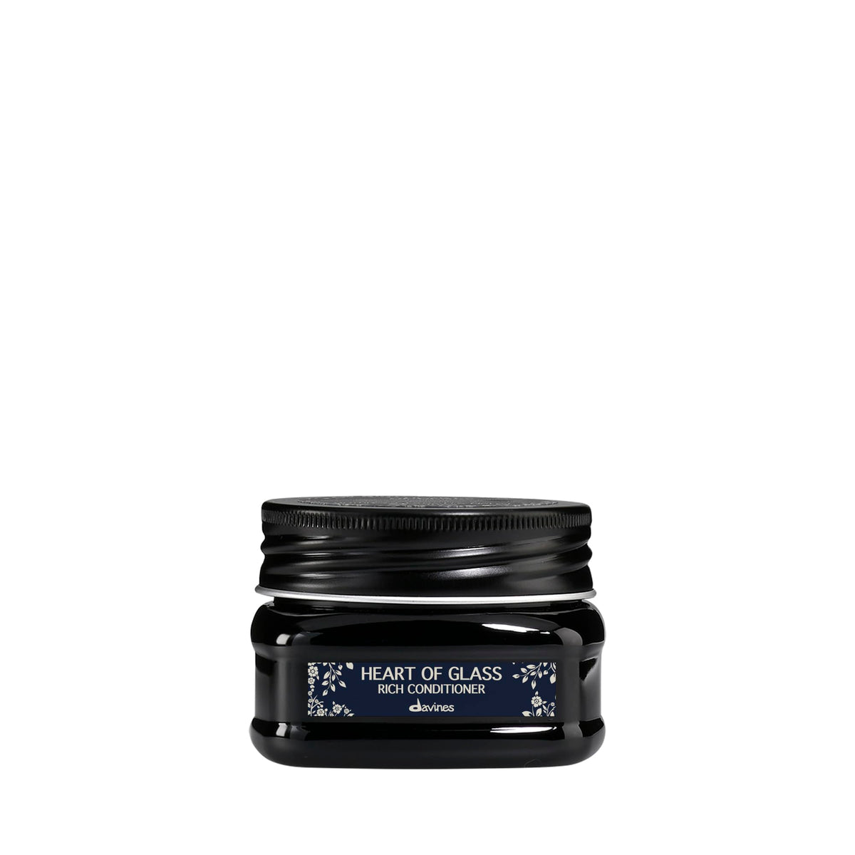 Davines front packaging shows compact conditioner for travel convenience
