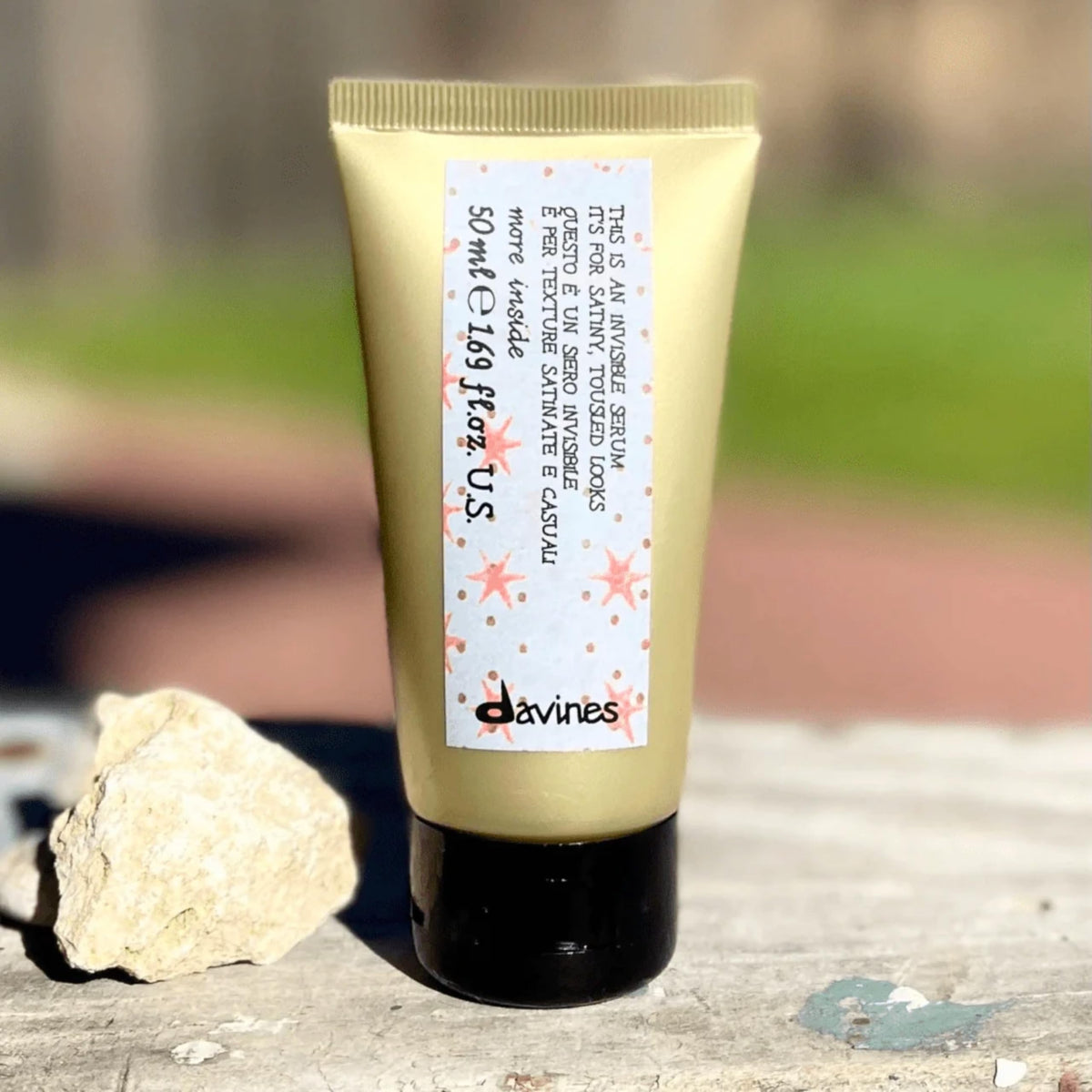 Davines serum on dry tousled hair showing soft undone texture and natural movement benefit