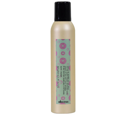Davines bottle front view showing sleek pump and product identity for styling control
