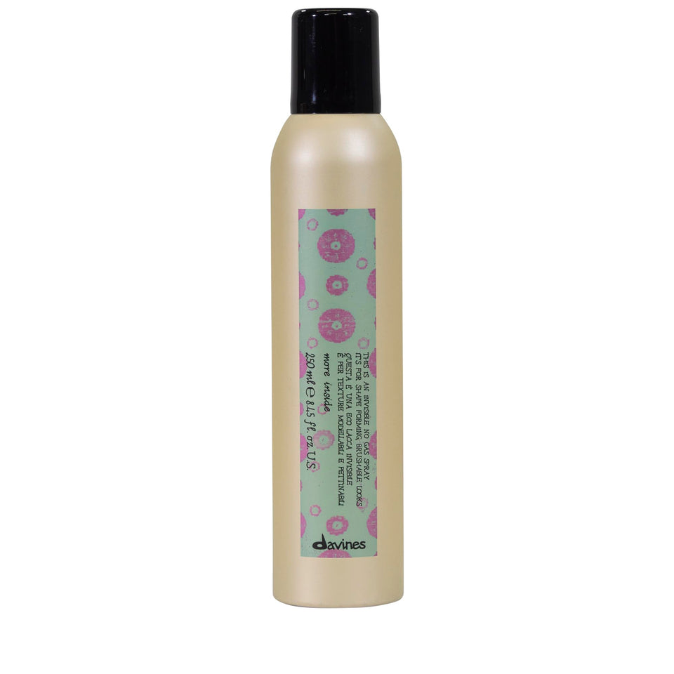 Davines bottle front view showing sleek pump and product identity for styling control