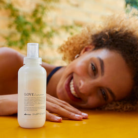 Davines LOVE Curl Primer milky texture close-up showing lightweight hydration