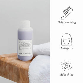 Davines LOVE dispensing cream on hand demonstrating easy spreadability and non-greasy finish
