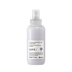 Davines front packaging of LOVE SMOOTHING milk showing bottle and label, highlights size and clarity
