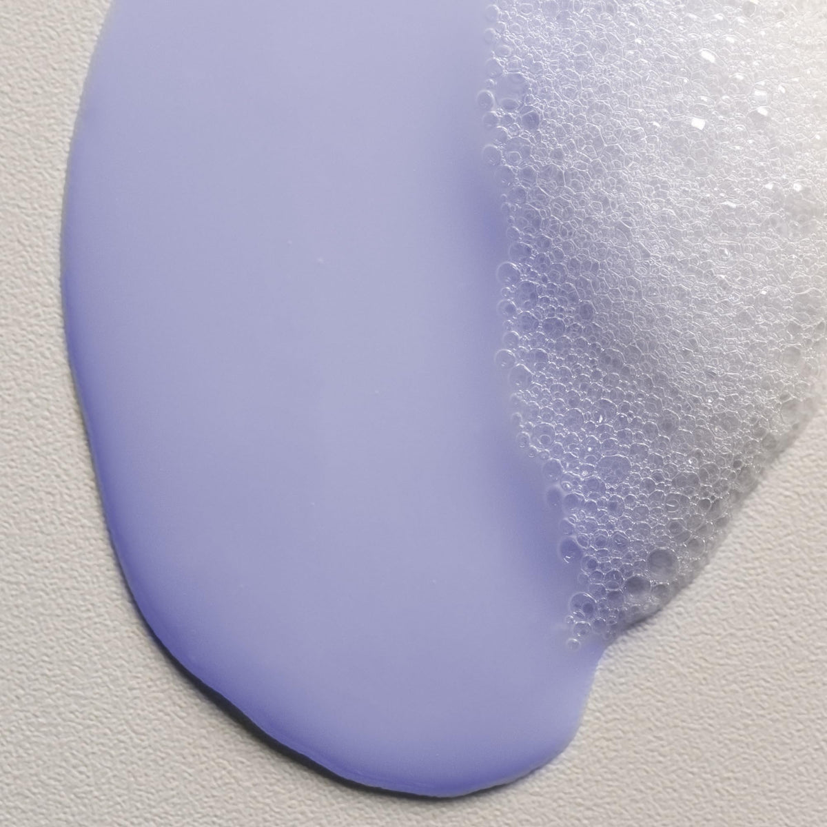 Davines shampoo being applied in shower showing gentle cleanse benefit