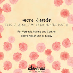 Davines jar held in hand demonstrating 4.23 fl oz scale and portability
