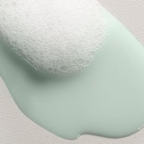 Davines MELU lather in hand illustrating easy application and improved manageability