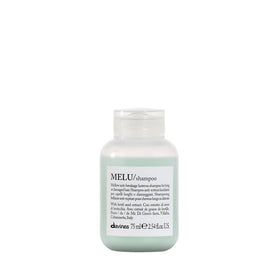Davines MELU travel bottle front showing compact design and benefit of gentle cleansing